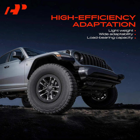 Low angle view of off-road vehicle with rugged tires under a starry night sky, highlighting high-efficiency adaptation and load capacity.