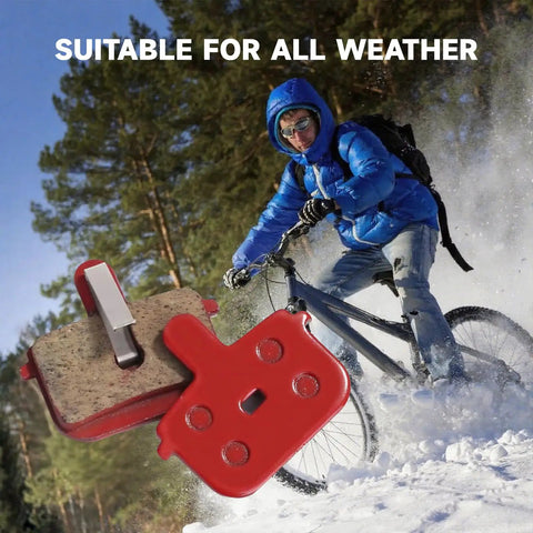 Four Pairs Durable Resin And Semi Metal Disc Brake Pads With Retaining Springs For Mountain Bikes And Electric Mountain Bikes High Bite Quick Break In Low Disk Wear shown with cyclist in winter setting.