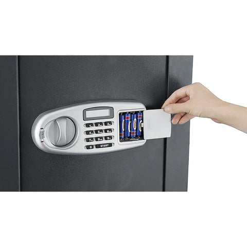 Fireproof Home Safe With Electronic Lockbox And Keypad, Includes Two Keys And Interior Shelf For Cash Jewelry Documents And More, 1700 Degree Fire Rating For 30 Minutes, Wall or Floor Mountable showing battery compartment.