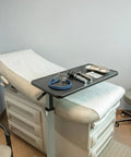 Heavy Duty Adjustable Overbed Table With Ball Bearing Casters, Versatile Rolling Bedside Desk For Hospital Couch Or Wheelchair, No Hassle Portable Laptop Stand For Home in a medical setting.