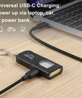 Three Pack Bright Rechargeable Keychain Flashlights With Clip And Magnetic Base Mini LED Key Ring Light shown charging via USB-C on laptop