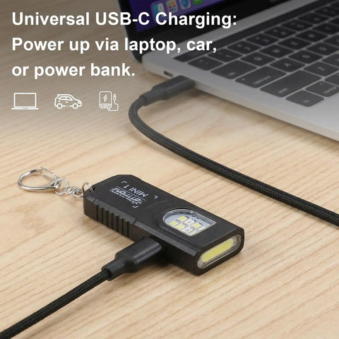 Three Pack Bright Rechargeable Keychain Flashlights With Clip And Magnetic Base Mini LED Key Ring Light shown charging via USB-C on laptop
