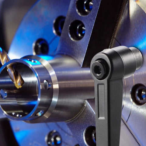 Close-up of a metal component with a Three Piece Zinc Alloy Clamping Lever Thumb Ratchet For Trailer Jack Handle Ratcheting Wrench.