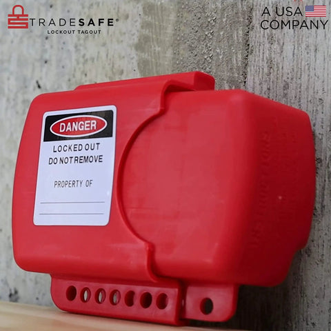 Adjustable Flanged Ball Valve Lockout For Two Inch To Four And One Half Inch Flanges Red Polypropylene Valve Lock For Gas Oil Or Water Lines Lockout Tagout Industrial Grade Built Tough, mounted on wall.