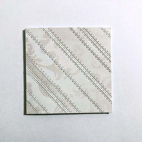 Embossed design on cardstock using 4 Piece Rectangle Frame Die Cut Set With Dotted Stitched Borders For Scrapbooking, Card Making