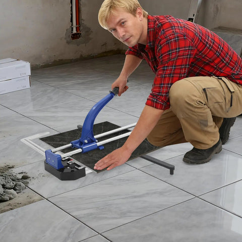 A person using the 24 Inch Manual Tile Cutter With Tungsten Alloy Wheel and Double Rail Track for precision cuts.