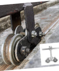 Heavy Duty Industrial Door Track Rollers With Steel Wheels And Bearings For Sliding Doors Cabinets And Closets Durable Door Pulley And Track Guide For Wood Door Tracks High Load Capacity Smooth Quiet Glide in use on a rail track system.