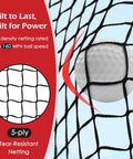 Close-up of golf ball against 5-ply tear-resistant netting from Golf Practice Net Set 10x7ft Heavy Duty Net With Mat Target Cloth 6 Balls 8 Tees Rubber Tee And Carry Bag For Backyard Driving Chipping Indoor Outdoor Training.