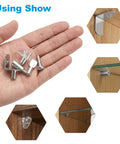 Heavy Duty Nickel Plated Shelf Pegs Pins Kit 80 Piece Set showing hardware in hand, including screws and brackets for shelving.