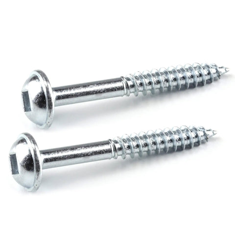 Close-up of two zinc pocket-hole screws 1-1/4 inch fine thread Maxi-Loc head for woodworking indoor projects.