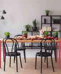 Sleek F Shape Metal Table Legs Set Of Four With Quick Install And Zero Drill Hassle For Modern Diy Dining Coffee Console Tables featuring a wooden table with black chairs.