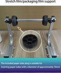Heavy Duty All Metal Roll Holder And Dispenser For Bubble Wrap And Stretch Film With Weighted Stable Base For Commercial Packing Tasks, showing a packaging film support with adjustable rollers.