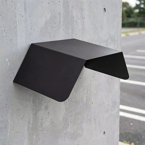 Heavy Duty Aluminum Wall Mount EV Charging Station Rain Shield Weatherproof Canopy mounted on a concrete wall.