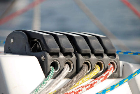 Installed Spinlock XTS rope clutch, single alloy unit for 8–14 mm rope, on boat deck with braided lines