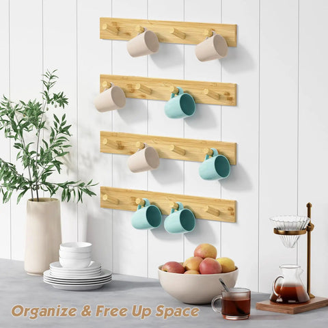 Natural Wood Wall Coat Rack Set Of 4 Wall Mount Hooks holding mugs in a kitchen setting