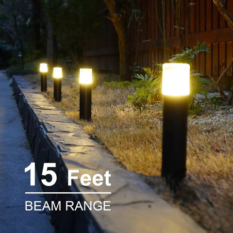 Low Voltage Pathway Lighting Kit 8 Pack Bollard Landscape Lights 2W 2700K Warm White LED Wired Path Lights 100 Lumens Metal Outdoor Brown Finish With Stake Connector For Walkways And Driveways illuminating a garden path at night