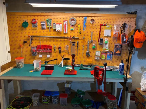Workbench with tools and ESD Soldering Mat Roll 23.6 by 118 Inches Rubber Workbench Pad 0.08 Inch Thick Anti Static Heat Resistant.