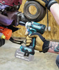 18V LXT Brushless Cordless One Half Inch Impact Wrench With Friction Ring Anvil Tool Only Four Speed Settings And High Torque For Heavy Duty Jobs Compact Ergonomic Design used on machinery