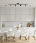 6 Light Foldable LED Integrated Track Lighting Slick Matte Black With Center Swivel Heads in modern kitchen setting