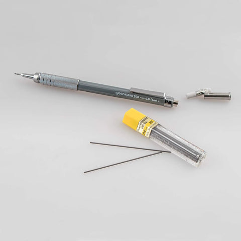 Graph Gear 500 Automatic Drafting Pencil 0.9mm with gray barrel, 4mm sleeve, and mesh grip, includes Hi Polymer lead and eraser cap.