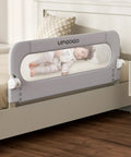 Foldable Toddler Bed Rail Guard With Bulletproof Anchor Strap And Zero Slide Base Design Heavy Duty Grey toddler rail beside sleeping child