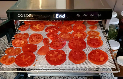 Tomato slices on 8 Pcs Silicone Dehydrator Sheets Set in use, Premium Non Stick Dehydrator Mats For Food Dehydration, 14x14 Inches