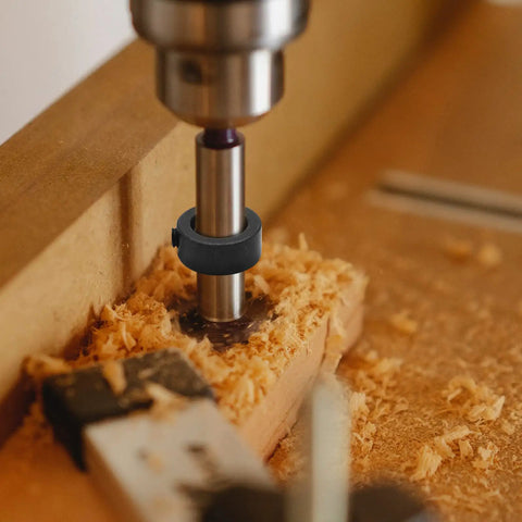 Close-up of 8 Piece Drill Bit Depth Stop Collar Set With Allen Key Wrench For Precise Drilling on wooden surface with shavings