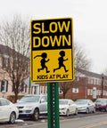 Slow Down Kids At Play Road Sign For Neighborhoods, Aluminum Weatherproof Safety Plaque, installed on street post