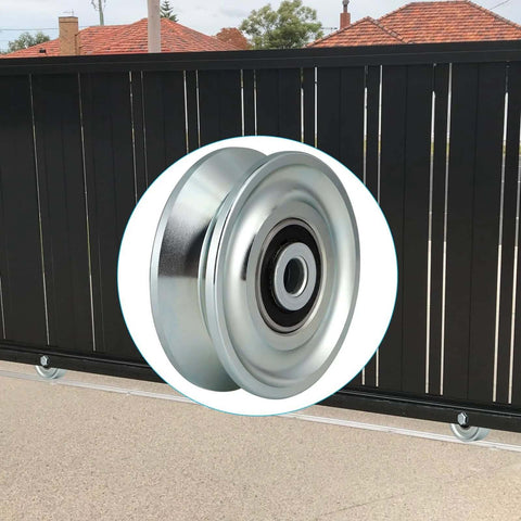 Close-up of a 3-inch metal V-groove wheel with double bearings for sliding gates