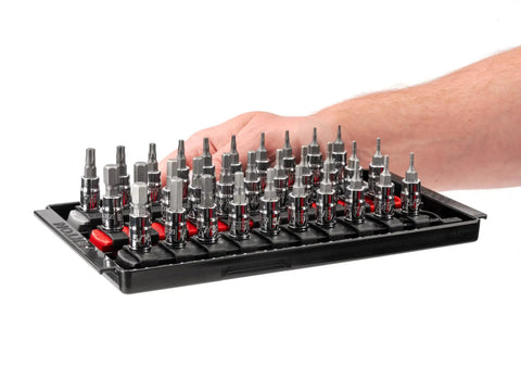 Hand holding 31-piece 1/4 Inch Drive Hex And Torx Socket Set With Rails And Tray, SAE And Metric Bits, ideal for quick home garage projects