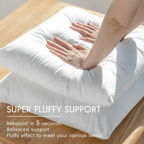 Hands pressing on Premium Outdoor Pillow Inserts Pack Of 2 Square 18 By 18 Inches Water Resistant Polyester Throw Pillows