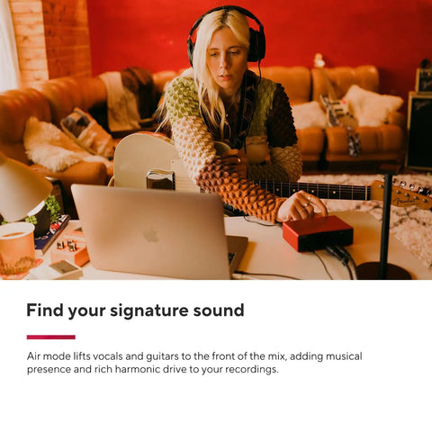 Person using Scarlett Solo Studio 4th Gen USB Audio Interface Bundle With Condenser Microphone And Studio Headphones in a cozy room