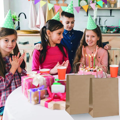 Children at birthday party with Brown Paper Bags With Handles 8x4.25x10.5 Inches Medium Gift Bags Bulk 100 Pack Recycled Kraft Paper