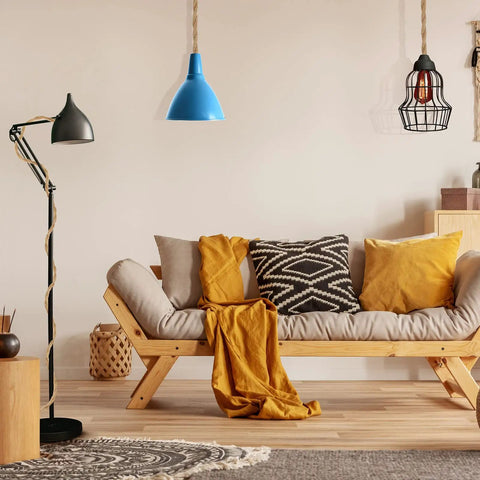 Stylish living room with Six Pack 15 Feet Pendant Light Cord Kit With Twisted Nylon Rope And Plug In Switch E26 Socket Vintage Ceiling Hangin Lights For Kitchen Farmhouse Bedroom DIY Decor Easy To Install And Customize Length For Your Lamps And Lighting Projects hanging above a modern couch.