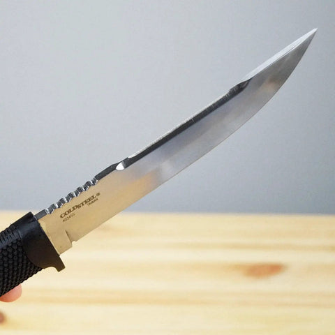 Close-up of Outdoorsman Lite 6 Inch Fixed Blade Knife with 4116 Stainless Steel, textured Kraton handle, angled blade view.