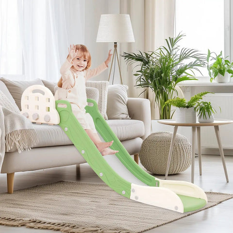 Built Tough Toddler Couch Slide For Bedroom And Family Room Safe Hdpe Indoor Play Ramp With Secure Side Rails Holds Up To Two Hundred Twenty Pounds No Sweat Setup And Compact Storage Look In Cool Green And White, child using slide in bright living room.