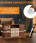 4 Pack Ball Bearing Swivel Casters, 360 Degree Rotation Universal Caster Wheels, 200 Pound Capacity Stick On Mini Wheels For Trash Cans, Storage Boxes, And Small Furniture, White, shown installed on cabinet for easy mobility.
