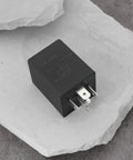 Dual Pack 12V Automotive Delay Relay Module 40A High Current SPDT Time Delay Relay 10 Second On Off Delay 5 Pin Glow Plug Compatible, black relay close-up
