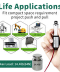 Hand holding Tiny 2 Inch Stroke 12V DC Linear Actuator With Controller Kit 64N, for robotics and home automation projects