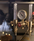 Front view of YESWELDER dual-output argon regulator with two flow meters, brass body, CGA580 inlet.