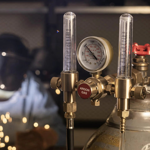 Front view of YESWELDER dual-output argon regulator with two flow meters, brass body, CGA580 inlet.