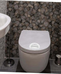 Two Pack Self Adhesive Cabinet Handles And Sliding Door Pulls For Kitchen Cupboards And Bathroom Cabinets Nordic White Modern Minimalist Look With Easy Peel And Stick Installation mounted on a toilet lid in a bathroom setting.
