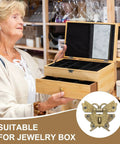 Heavy Duty Vintage Butterfly Hasp Latch Kit For Decorative Wooden Boxes And Jewelry Cases Boasting A Hella Nice Yellow Bronze Finish, showcased on a jewelry box.
