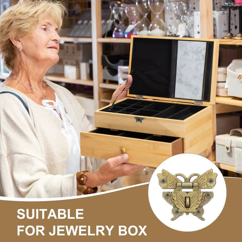 Heavy Duty Vintage Butterfly Hasp Latch Kit For Decorative Wooden Boxes And Jewelry Cases Boasting A Hella Nice Yellow Bronze Finish, showcased on a jewelry box.
