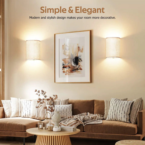 Living room with set of two battery rechargeable wall sconces with remote control, 3 color modes, dimmable ambient lighting