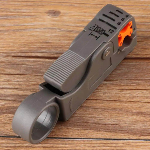 Coaxial Cable Stripping And Crimping Tool With Adjustable Two Blade Knife, Compatible With 4 5 6 And 7 Coax Cables, on wood surface