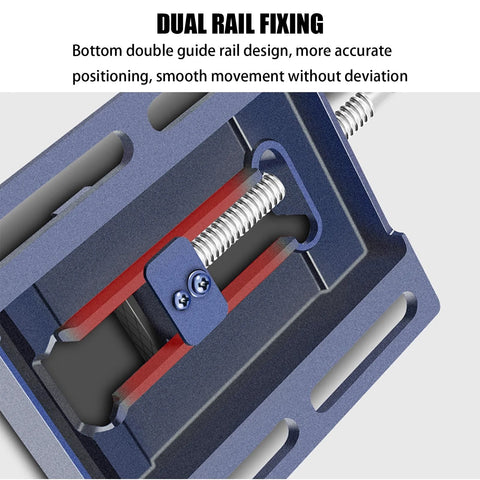 Close-up of small fixed woodworking table vise, blue metal bench vise with dual rail and threaded screw (5in/125mm)