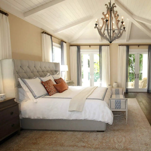 Bedroom with a chandelier lit by 60W Equivalent Clear Soft White Dimmable LED Light Bulb B11 E12 Candelabra Base 500 Lumens 2700K.