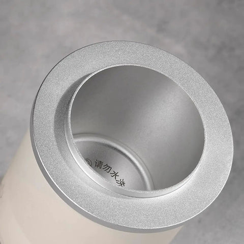 Interior view of Total Game Changer Aluminum Coffee Dosing Cup And Espresso Digital Scale Combo With Rechargeable Sensor And 0.1 Gram Precision For Classic 58Mm Portafilters Rock Solid Gear.
