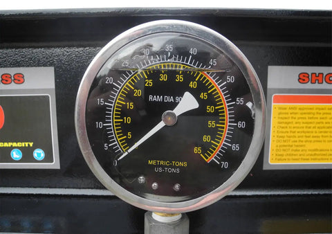 Real Deal 40 Ton Air Hydraulic Shop Press gauge displaying pressure levels for precision automotive repairs with measurement details.